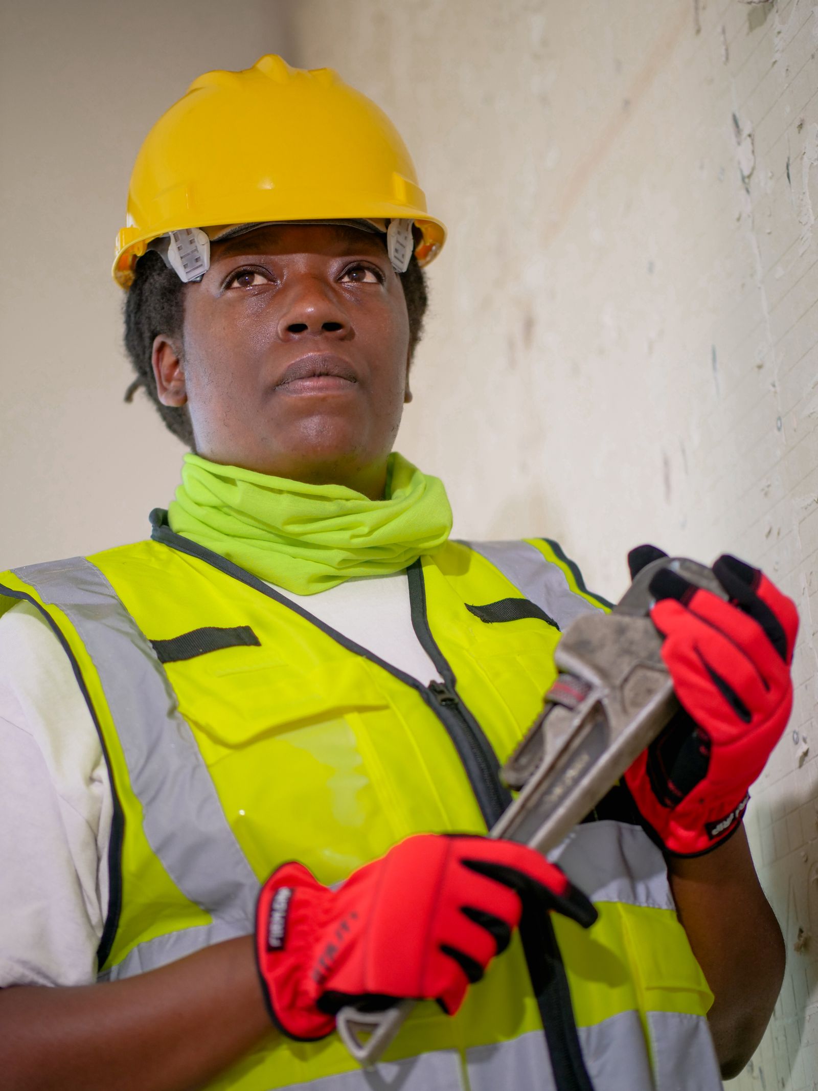 Professional licensed plumber in safety gear ready for a repiping job in Wilmington NC